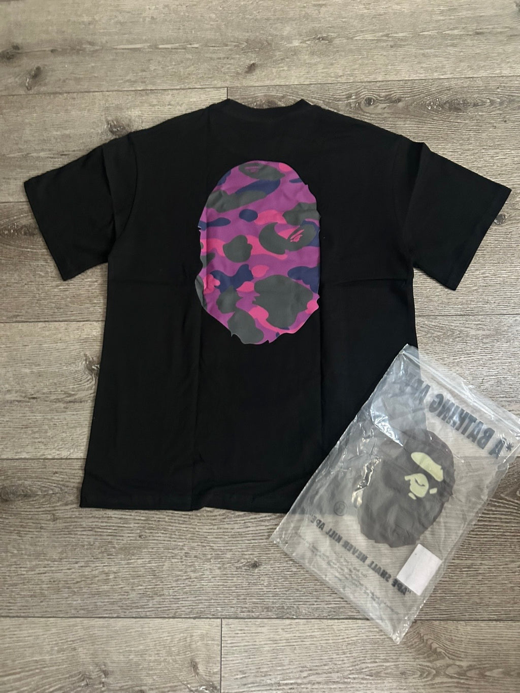 Black shirt with purple face