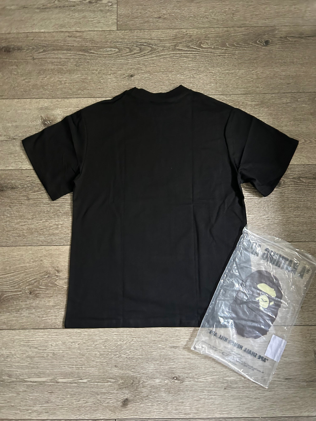 Black shirt with pink design