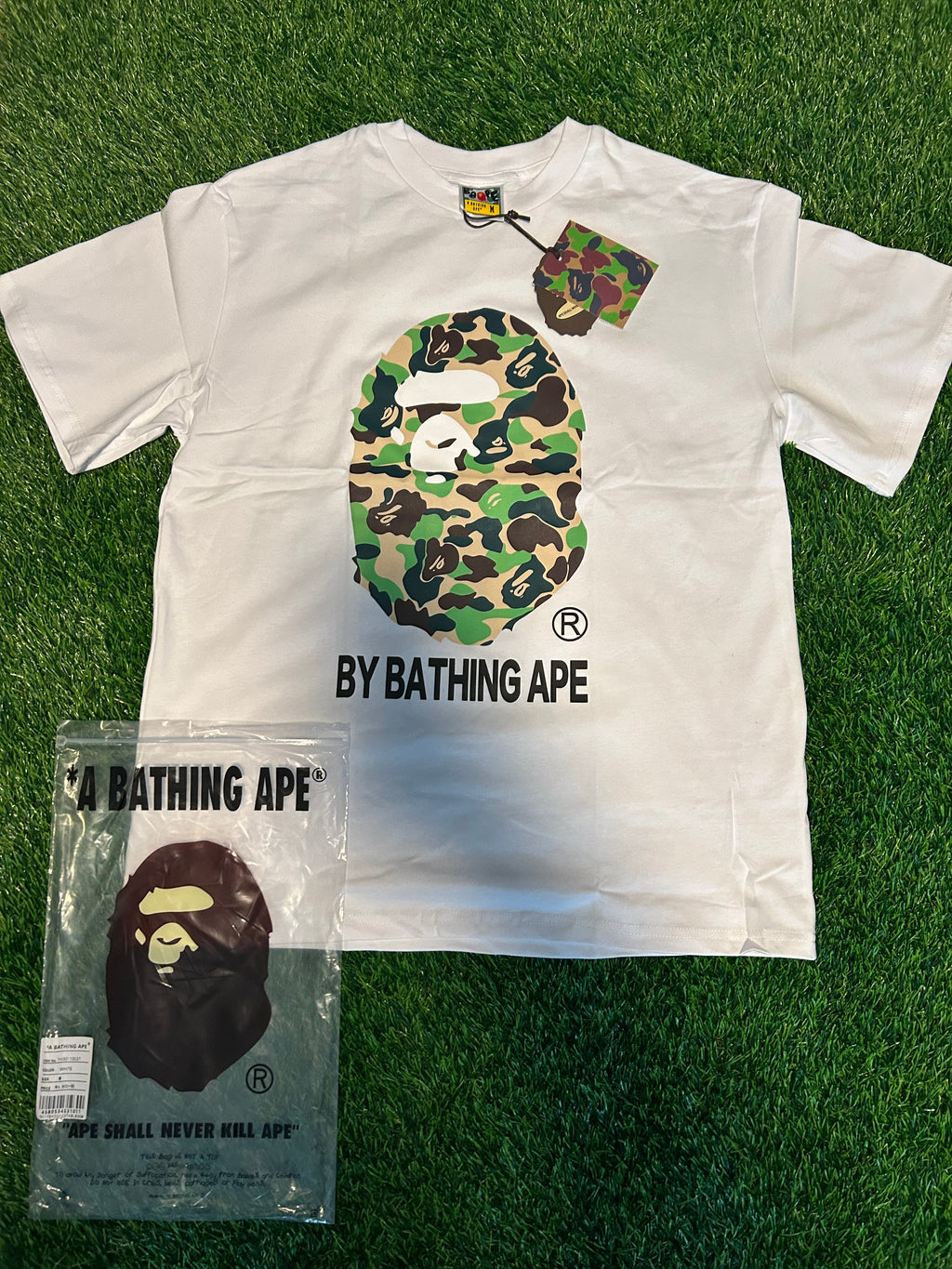 White shrit with green monkey