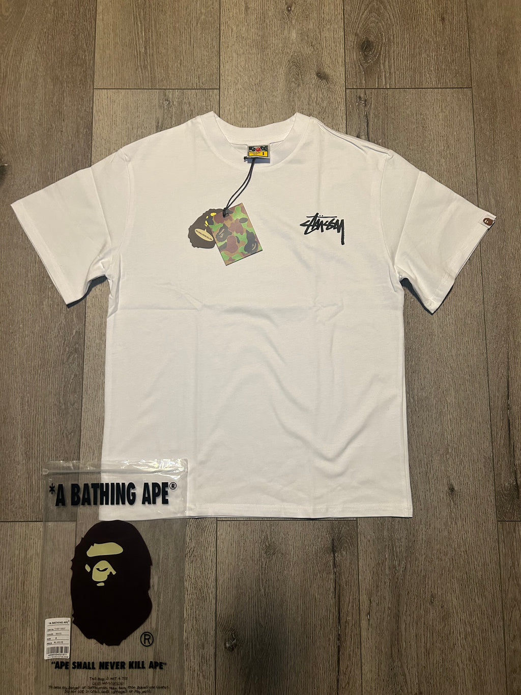White and stussy Tee