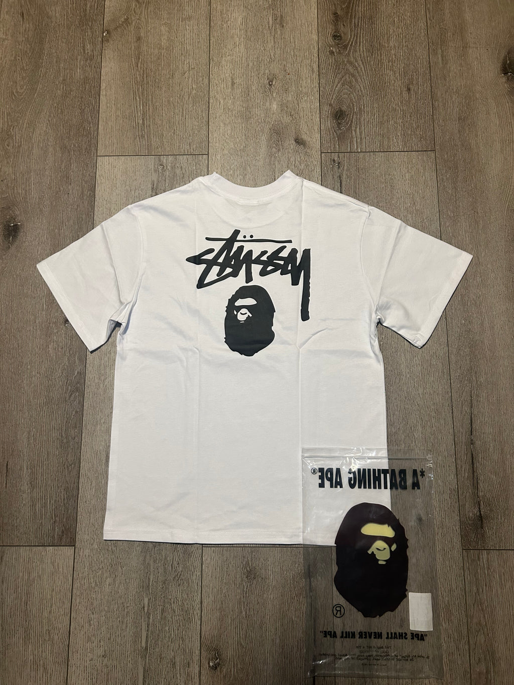 White and stussy Tee